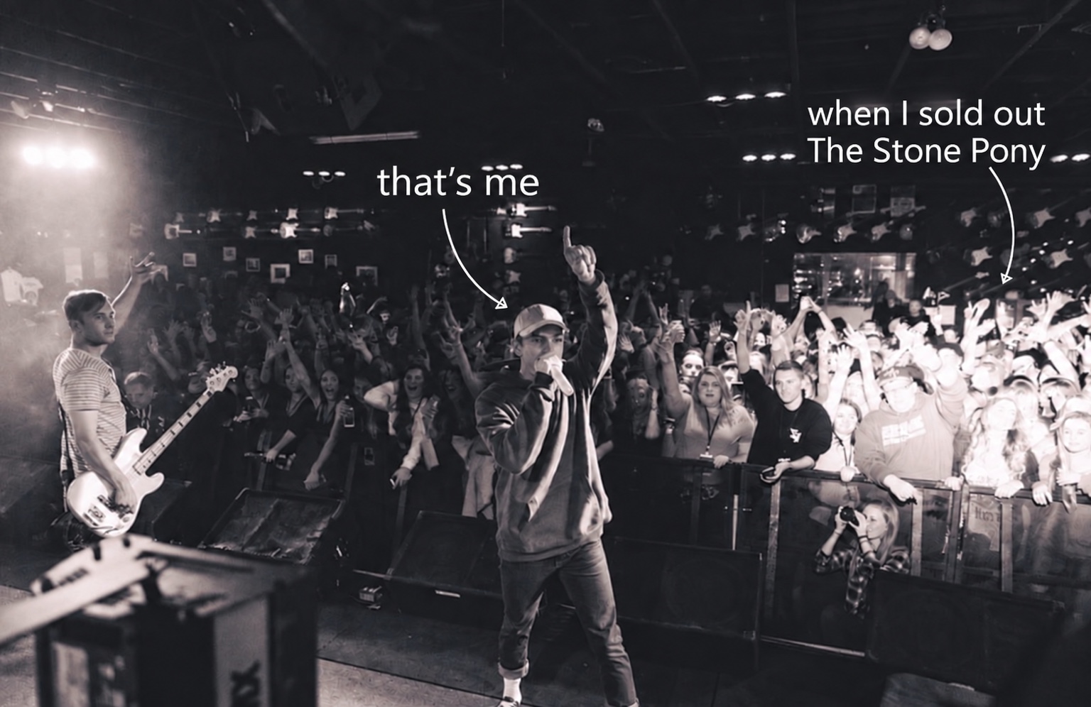 Ian McGirr performing at The Stone Pony, with annotations identifying him and the sold-out crowd.